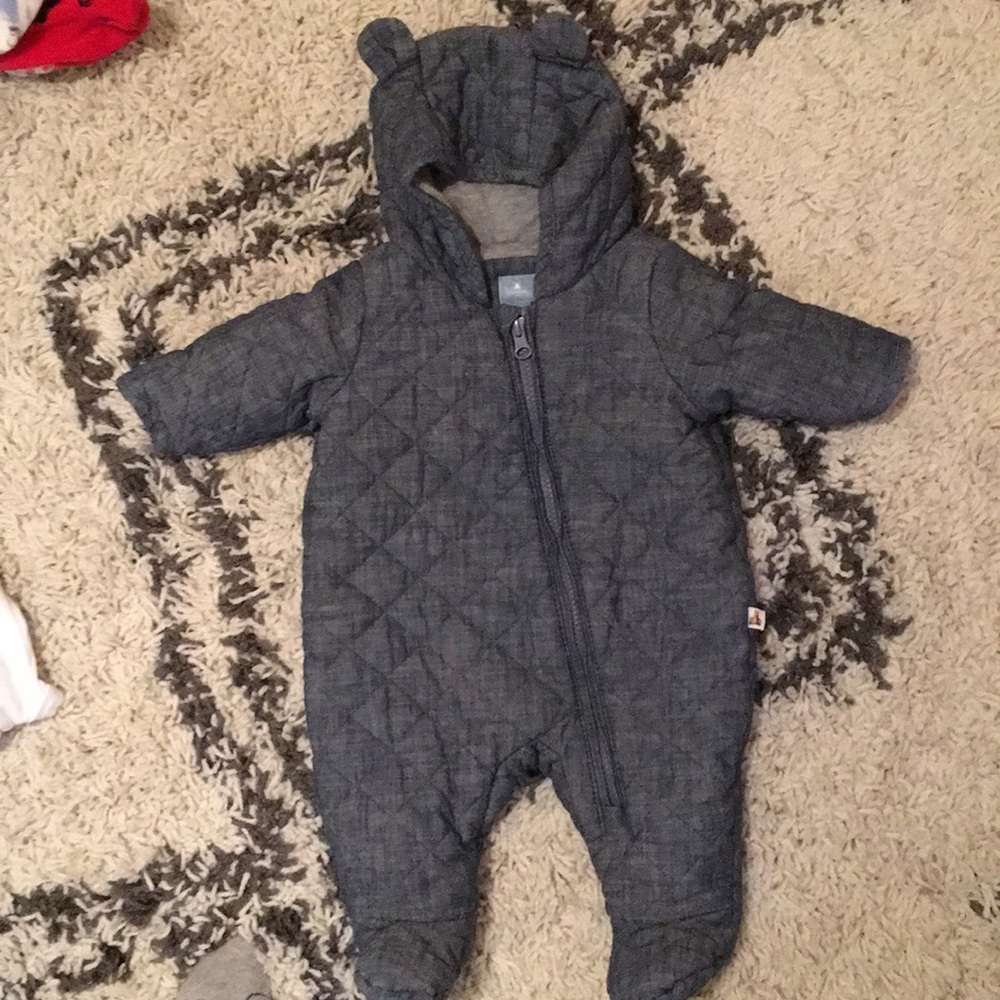 Keep your little warm in this precious zip up!